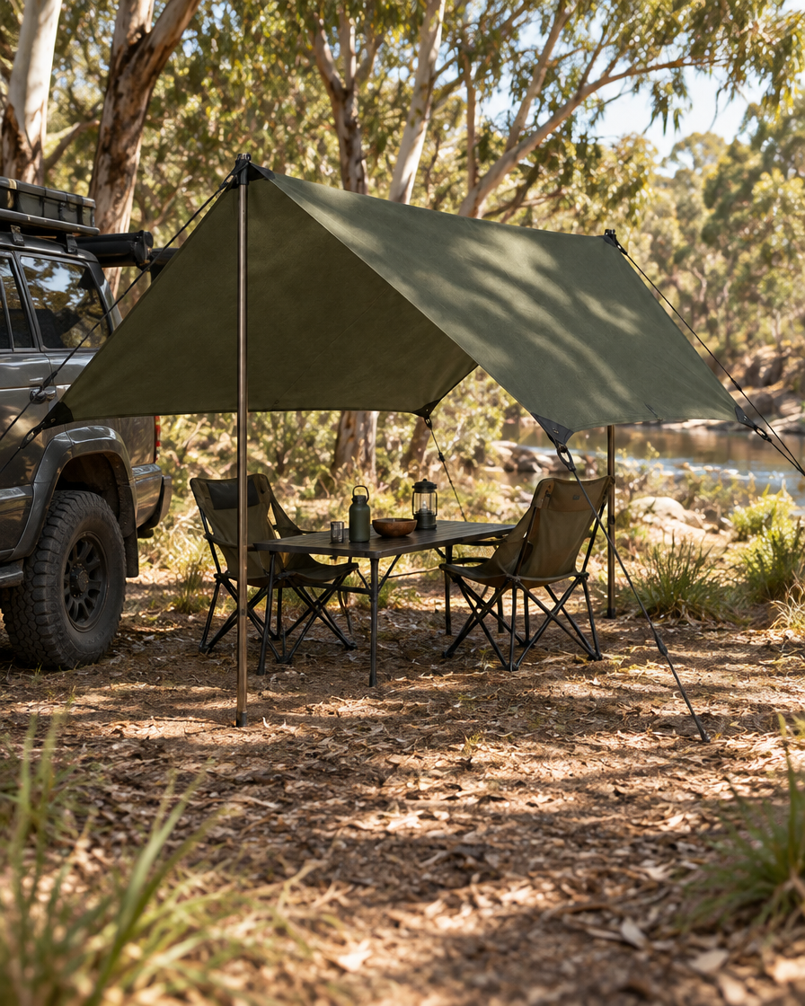 The Bracken Tarp 3x3 pitched off a 4WD at a bush campsite