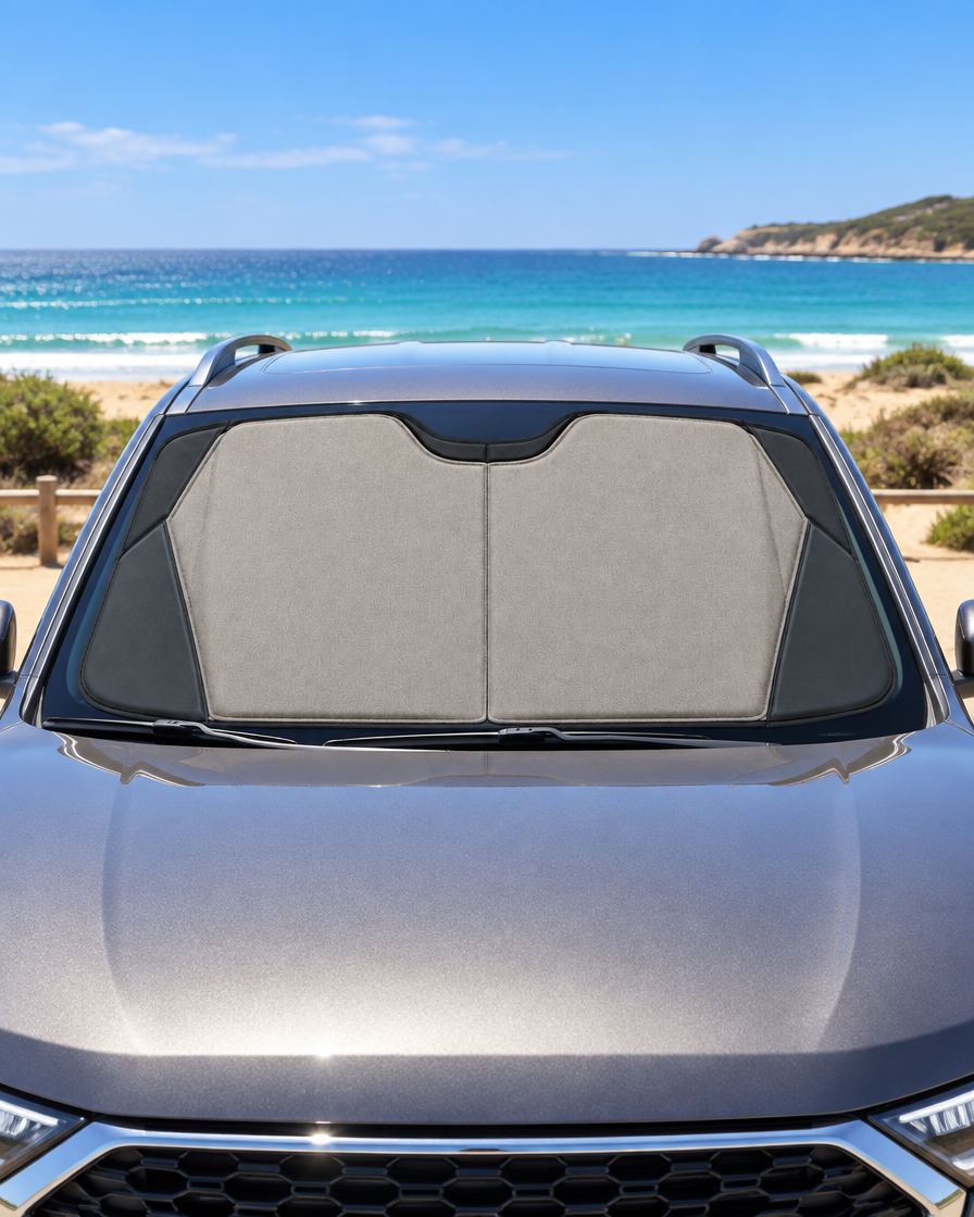 Basecamp Windscreen Shade fitted in a parked car at the beach