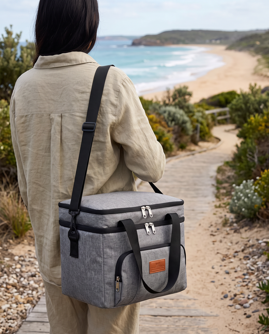 Insulated cooler tote carried on the shoulder to the beach