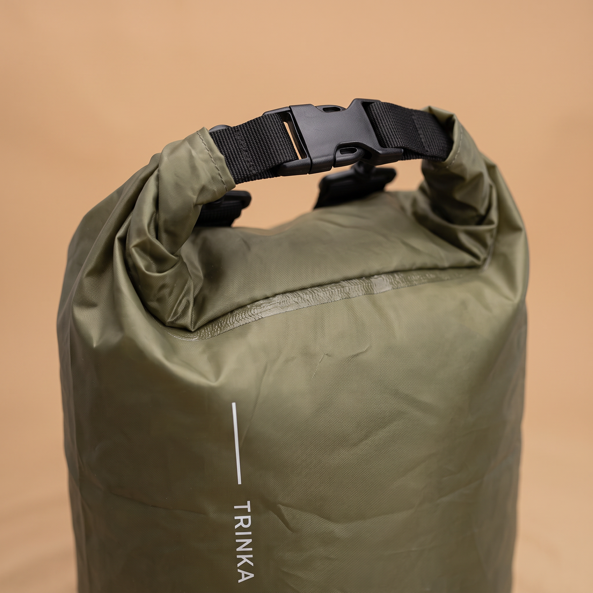 Roll-top dry bag buckle and seam detail